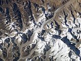 21Nasa ISS006-E-15502 Nangpa La To Tibet, Cho Oyu to Gyachung Kang From South Nasa close up photo of the Cho Oyu (8201m) to Gyachung Kang (7952m) ridge. The Nangpa La pass from Nepal to Tibet is in the centre